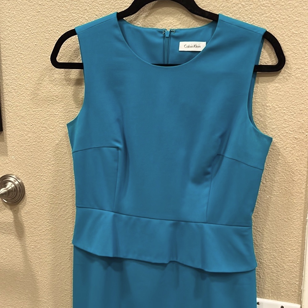 Sale! Gorgeous TEAL! Jewel neck line, tailored bodice and peplum posh to flatter
